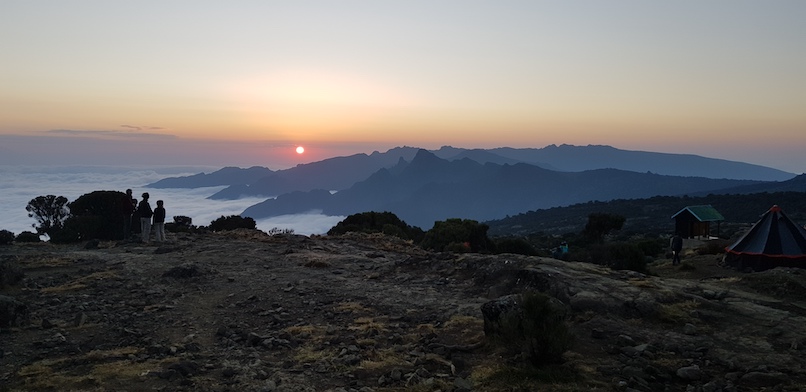 Sunrise at peak of Kilimanjaro with Earth's Edge